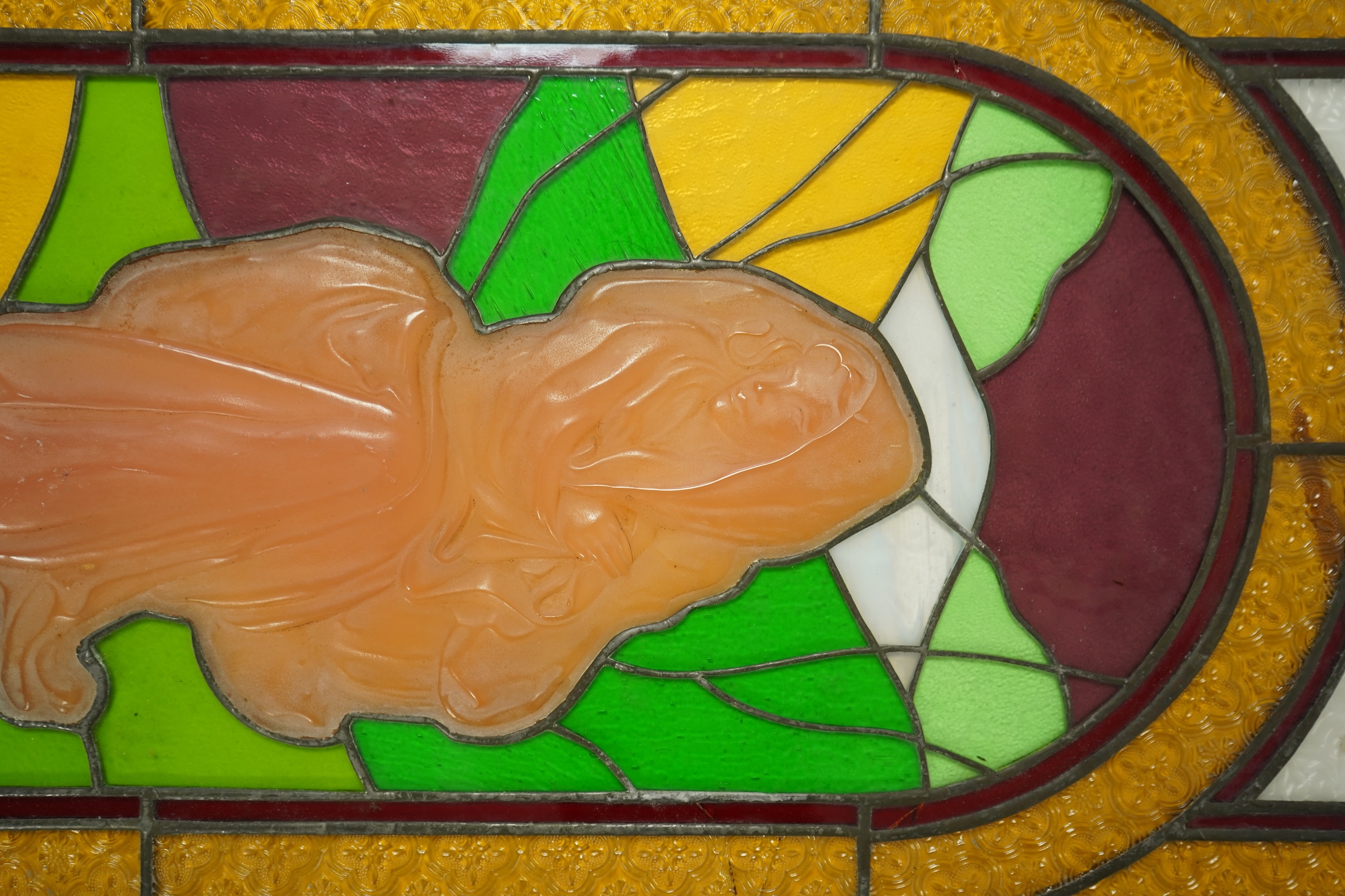 A pair of 20th century stained glass panels